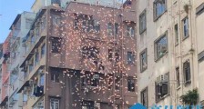 香港现金从天而降是怎么回事  撒钱的人究竟是谁意欲何为